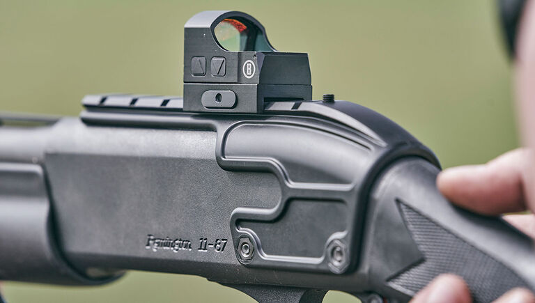 Close up of Bushnell RXS-100 Reflex Sight mounted on a shotgun