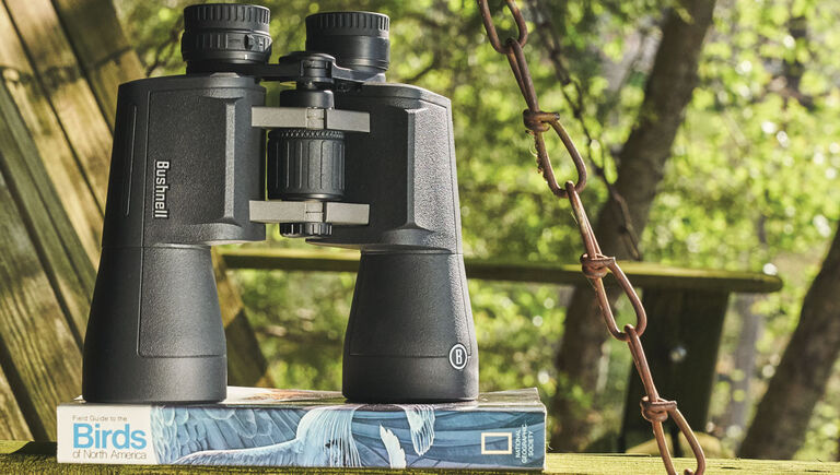 Bushnell Powerview 2 Binoculars on a bird watching book